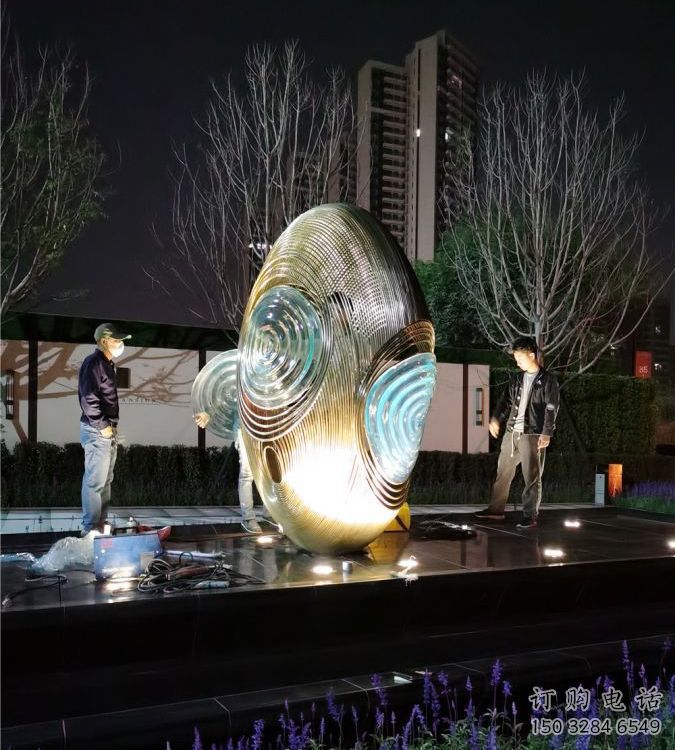 拉絲雞蛋雕塑廠家 鏤空創意擺件 現代不銹鋼雞蛋雕塑生產