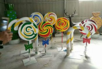 園林糖果雕塑廠家 街頭現(xiàn)代小品 中式不銹鋼糖果雕塑廠